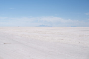 Beautiful Bolivia's Salt Flats. Shot in Salar de Uyuni salt flat. Water reflection of clouds and empty space. 