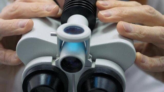Obstetrician and gynecologist. Examination under a colposcope.