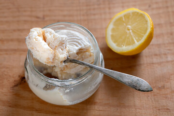 A spoon with delicious homemade lemon tiramisu.
