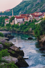 Fototapeta na wymiar Houses along the Neretva River, Mostar, Bosnia and Herzegovina