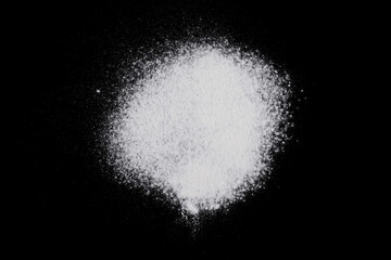 Flour on a black background.