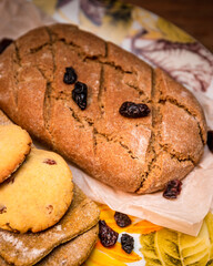 Homemade fresh bread, tortillas and cookies on dish