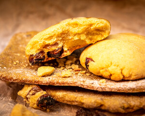 Homemade fresh tortillas and round cookies with raisins