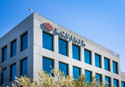 Redwood City, CA USA - February 10, 2021: Close up of an Equinix headquarters building. Equinix specializes in Internet connection and owns 220+ International Business Exchange IBX data centers.