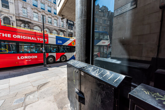 London, UK - June 26, 2018: The Original Tour Double Decker Red White Blue Bus With Sign On Building For Go Vegan