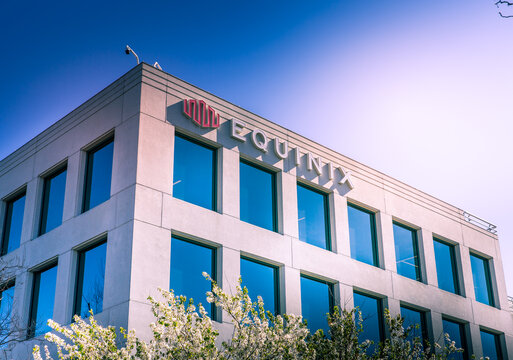 Redwood City, CA USA - February 10, 2021: Close up of an Equinix headquarters building. Equinix specializes in Internet connection and owns 220+ International Business Exchange IBX data centers.
