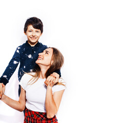 lifestyle and people concept, little cute boy with teenage girl posing together cheerful happy smiling isolated on white background