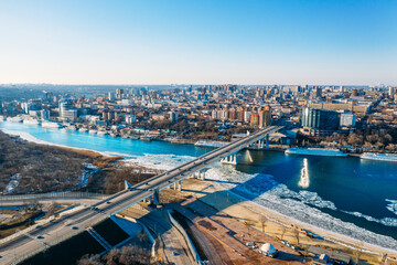 Voroshilovskiy Bridge above Don river and Rostov On Don aerial panoramic view of beautiful winter...