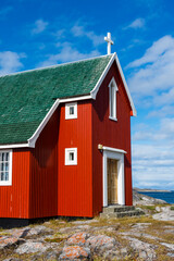 Greenland. Itilleq. Bright red church.