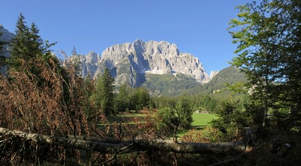 the end of the Valbruna valley with the Jôf di Montasio mountain in the Julian Alps in Italy