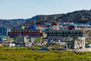 Greenland. Ilulissat. Dog town and houses beyond.