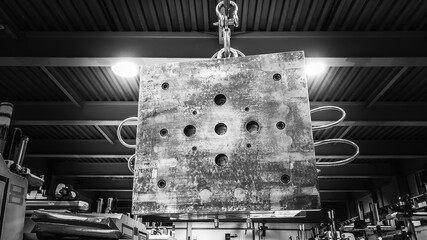 Mold for injection molding to produce plastics, on the background of production management in the...