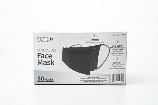 Illustrative Editorial of box of Disposable face masks photographed Clarkston, Michigan, USA -  02 22 2021 