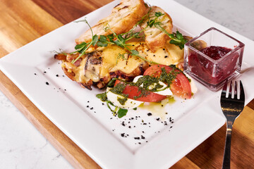 Restaurant fried tasty food, perfectly decorated dish on wooden board is ready to serve for guests. flat lay.