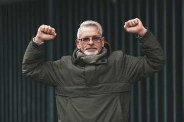 Strong and confident mature man. A healthy body and spirit in retirement.