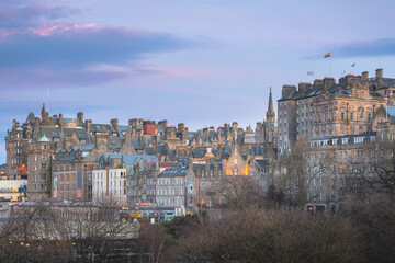 Fototapeta na wymiar Night cityscape skyline of old town Edinburgh, Scotland with colourful sunset or sunrise sky.
