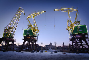 Szczecin, view of the waterfront and historic cranes. - obrazy, fototapety, plakaty