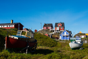 Greenland. Sisimiut. Fishing boats and colorful houses.