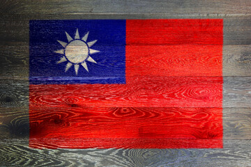 Taiwan flag on rustic old wood surface background