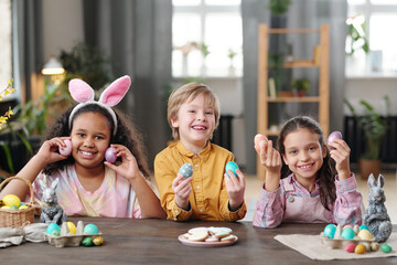 Happy children with Easter eggs