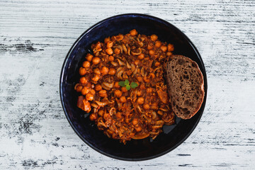 healthy plant-based food, vegan chickpea mushroom red pesto sauce with bukwheat fusilli pasta