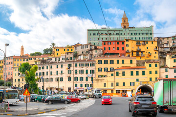 The town center of Ventimiglia, Italy on the Italian Riviera, with the colorful hillside homes and cathedral above.