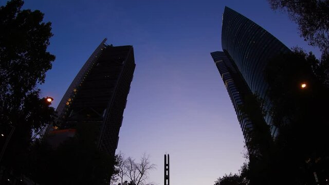 Evening timelapse in a low angle shot on Paseo de la reforma avenue in Mexico City