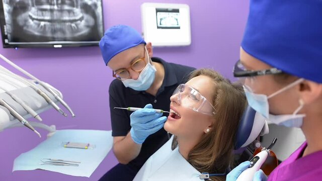 Woman Getting Dental Treatment
