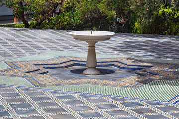 Old moorish fountain in the Fez. Morocco.