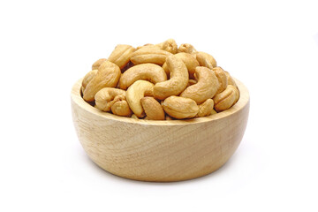 cashew nuts in wooden bowl isolated on white background