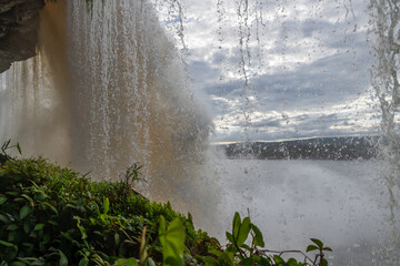 View of waterfalls falling on the lagoon in Canaima National Park (Venezuela).