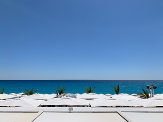 Obraz premium beach chairs and umbrellas
