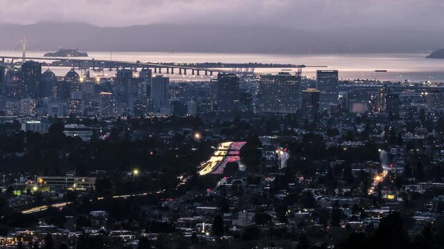 Time Lapse of Traffic and Oakland Skyline At Night