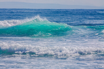 Scenic view of sea waves splashing on shore in Honolulu, Hawaii