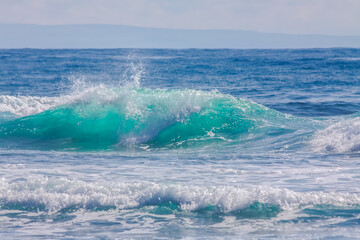 Scenic view of sea waves splashing on shore in Honolulu, Hawaii