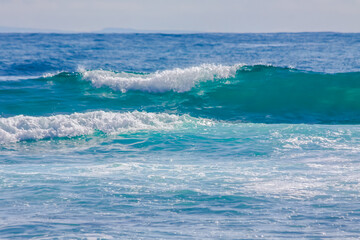 Scenic view of sea waves splashing on shore in Honolulu, Hawaii