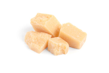 Pieces of delicious parmesan cheese on white background