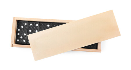 Wooden box with black domino tiles on white background, top view