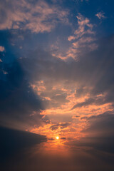 sunset over the sea with god rays