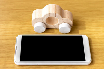 自動車をスマートフォンで検索するイメージ