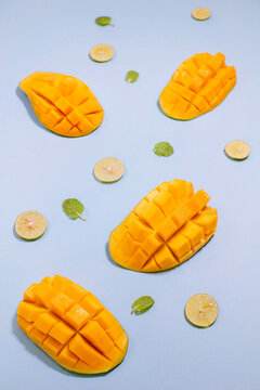 Fresh mango cut in blue background