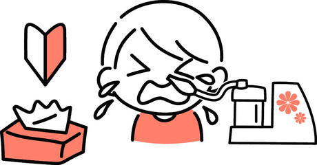 泣きながら鼻水吸引をする男の子