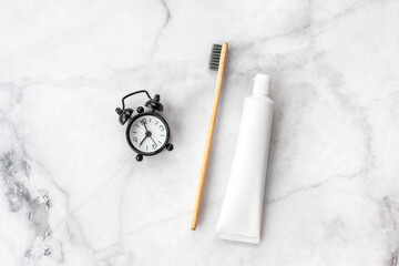 Set of eco-friendly toothbrushes and toothpaste on marble background. Dental and healthcare concept. Top view, flat lay. Free copy space. - 416192483