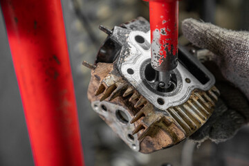 Grinding the motorcycle valve seat. Photo with noise