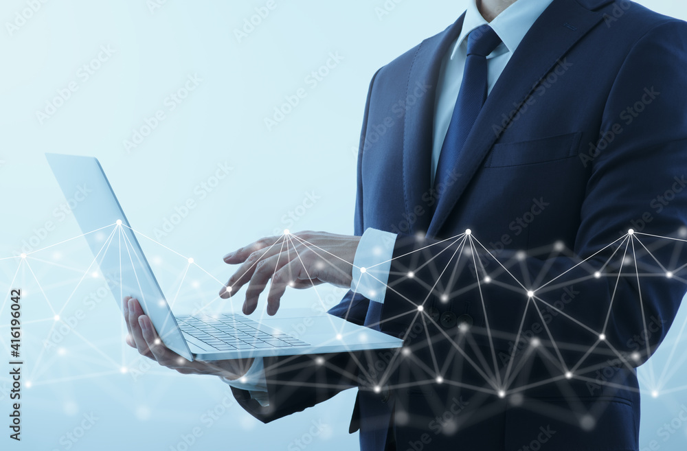Poster businessperson using laptop for internet. network structure and gray background.