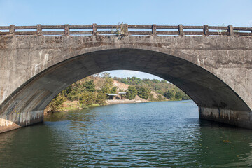 Nashik , India - 20 February 2021, Old Stone arch bridge over the small river at Nashik Maharashtra......