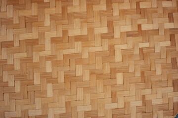 Indonesian traditional woven texture made of bamboo skin. beautiful pattern Javanese handmade kitchen tools. details of the food container and rice filter