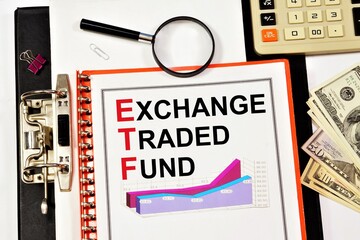 Exchange-traded fund. A text label in the investment research background folder.