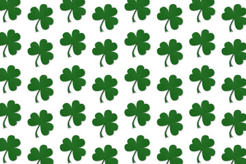 Fototapeta premium Fondo Dia de San Patricio. Blanco y Verde. Repetición de treboles. Con textura. 