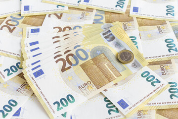 200 euro banknotes lined up on the background